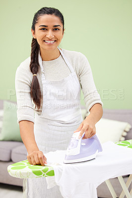 Buy stock photo Woman, iron and laundry for portrait in home with smile, pride or cleaning with steam for wrinkles. Person, cleaner and happy with machine for clothes with housekeeping, board and fabric in apartment