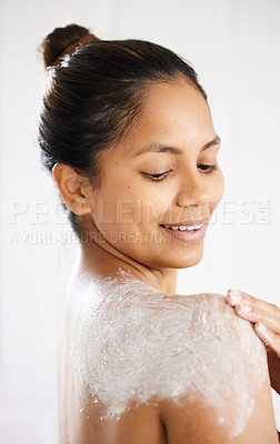 Buy stock photo Body skincare, scrub and back of woman in studio with cosmetics, anti aging glow or hydration. Lotion application, sunscreen and shoulder of model with moisturiser, smile or cream on white background