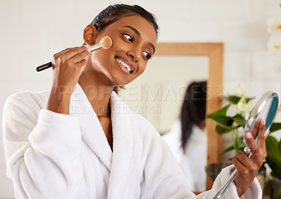 Buy stock photo Woman, home and makeup with mirror and morning routine with cosmetics brush for blush. Bathroom, beauty and smile from health and wellness in a house with face care and happy from skincare and robe