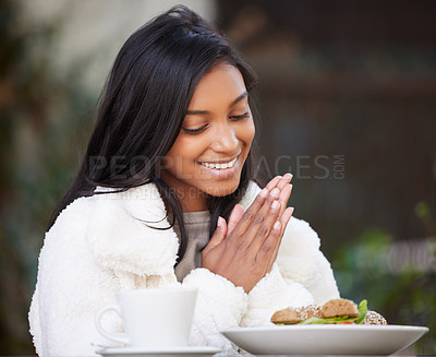 Buy stock photo Shot of a young woman having brunch