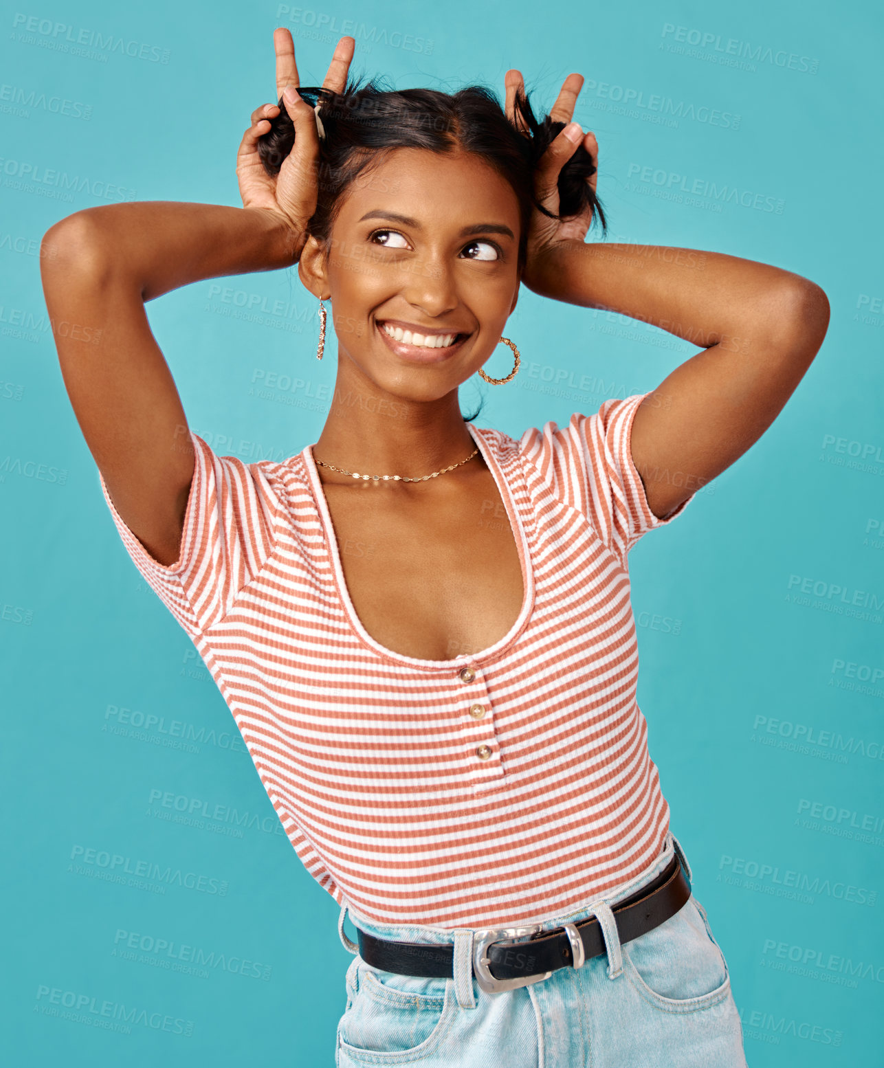 Buy stock photo Fashion, peace sign and woman in studio for trendy, stylish and streetwear clothes on isolated blue background. Smile, person and Indian model with hand gesture for emoji, happiness or confidence