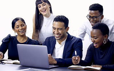 Buy stock photo Shot of a group of young businesspeople using a laptop at work