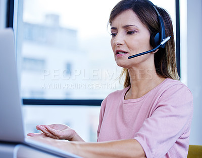 Buy stock photo Mature virtual assistant, laptop or woman in call center for customer service, tech support or contact. Face, agent or sales consultant talking in telemarketing, business or telecom company for CRM 