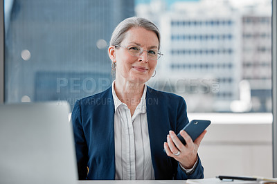 Buy stock photo Mature businesswoman, office and smartphone with portrait, smile and technology for communication. Senior manager, cellphone and mobile connection for professional, corporate career and email