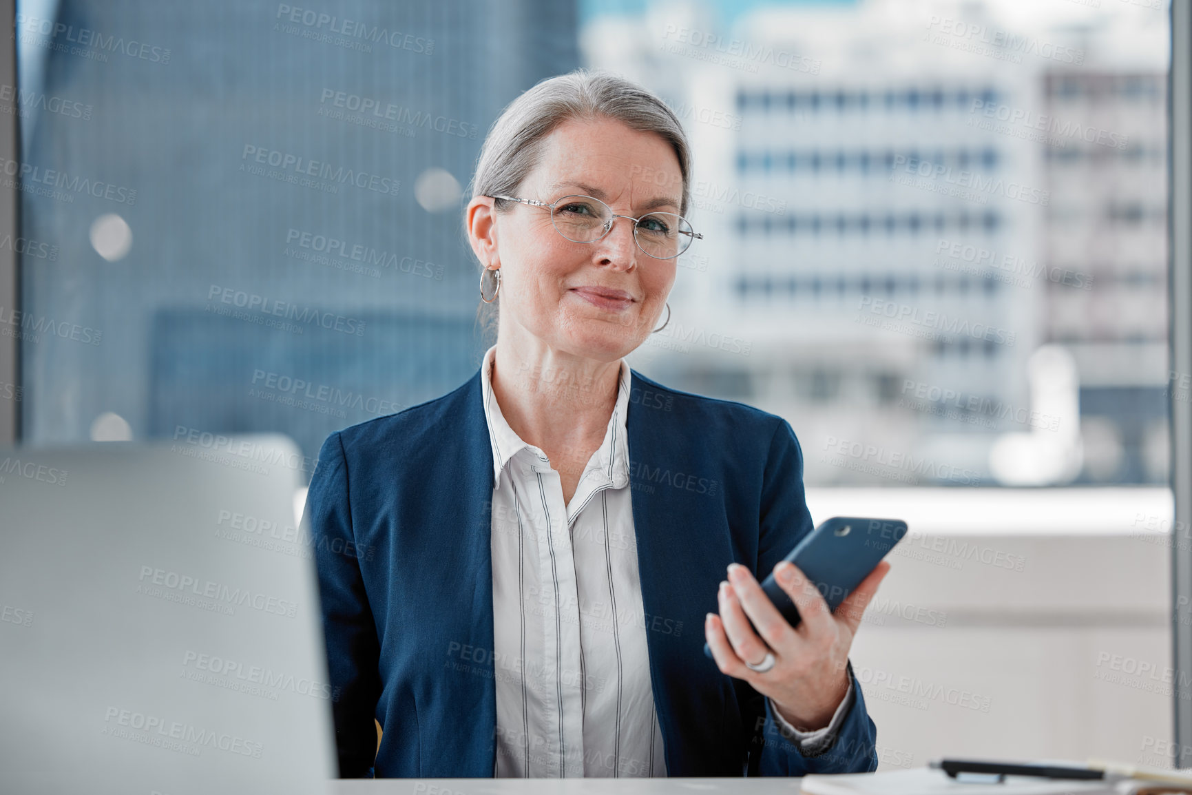 Buy stock photo Mature businesswoman, office and smartphone with portrait, smile and technology for communication. Senior manager, cellphone and schedule for agenda, project management and professional email