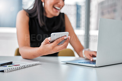 Buy stock photo Business woman, laptop and phone in office, employee and networking or check email and typing. Female person, professional and app for conversation, online and talk to contact on speaker for plan