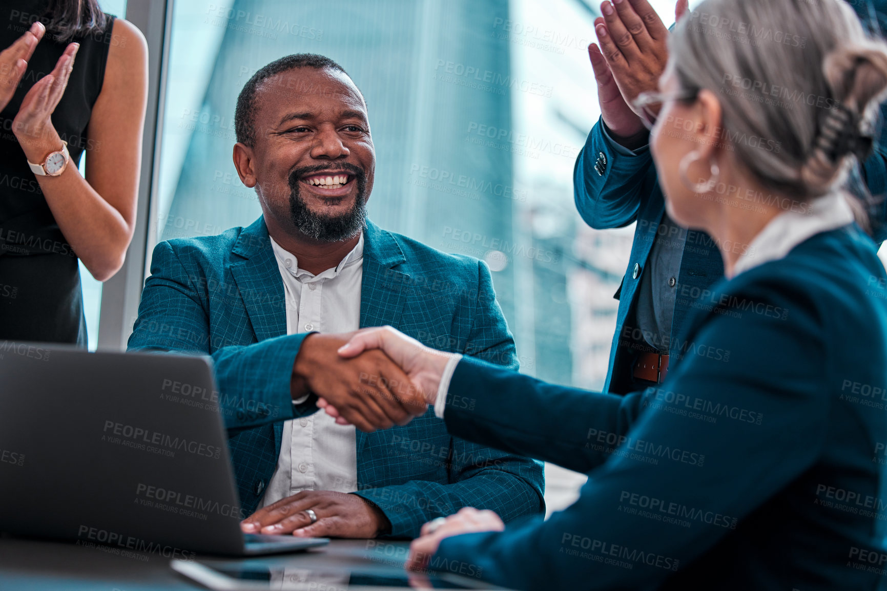 Buy stock photo Hiring success, meeting and business people with a handshake with applause at work. Happy, support and a black man shaking hands with a manager with workers clapping for partnership and welcome