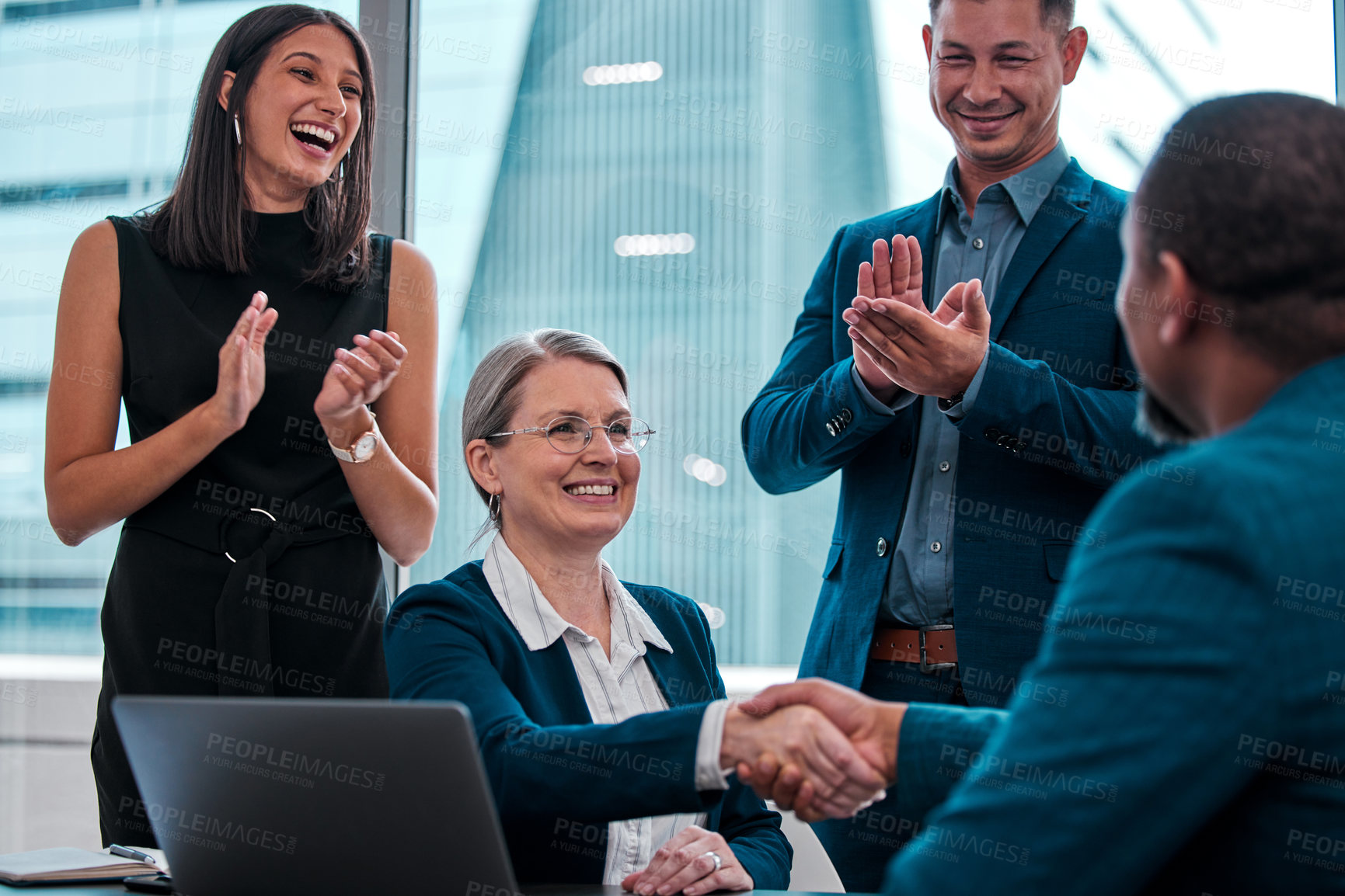 Buy stock photo Laptop, applause and business woman with handshake, deal and boardroom for negotiation,  boss and client. Collaboration, partnership and meeting for project, agreement and publicist for politics