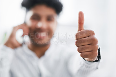 Buy stock photo Closeup shot of an unrecognisable businessman showing thumbs up in an office