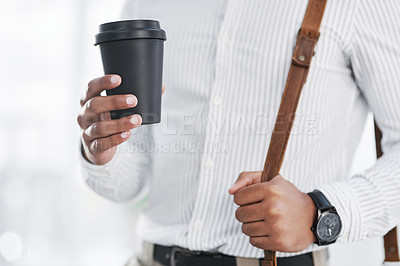 Buy stock photo Closeup shot of an unrecognisable businessman holding a coffee cup in an office