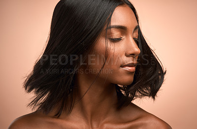 Buy stock photo Motion, beauty and woman in studio with a hair care, keratin and healthy salon treatment. Wellness, luxury and female model shake her shiny, clean and soft hairstyle or haircut by a brown background.