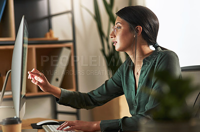 Buy stock photo Shot of a businesswoman touching her desktop PC screen