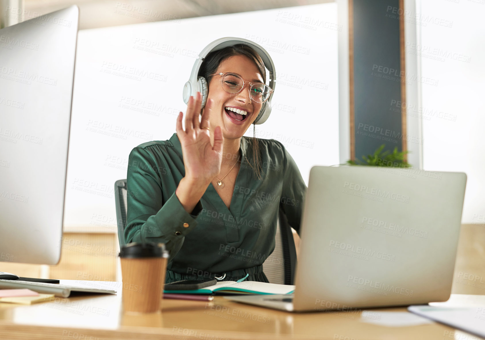 Buy stock photo Virtual meeting, business woman smile and wave on a video call with headphones and greeting. Laptop, working and employee with webinar at a company with computer and digital communication at office