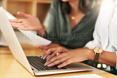 Buy stock photo Shot of a businesswoman typing on her laptop
