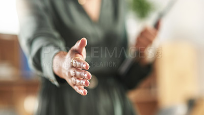 Buy stock photo Shot of a businesswoman holding her hand out for a handshake