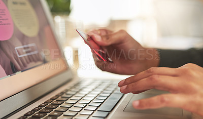 Buy stock photo Shot of a businesswoman using her laptop to make online purchases