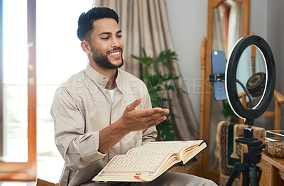 Buy stock photo Shot of a young muslim man busy recording his for her vlog