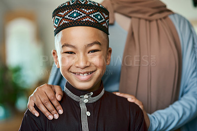 Buy stock photo Shot a young boy stand with his mother at home