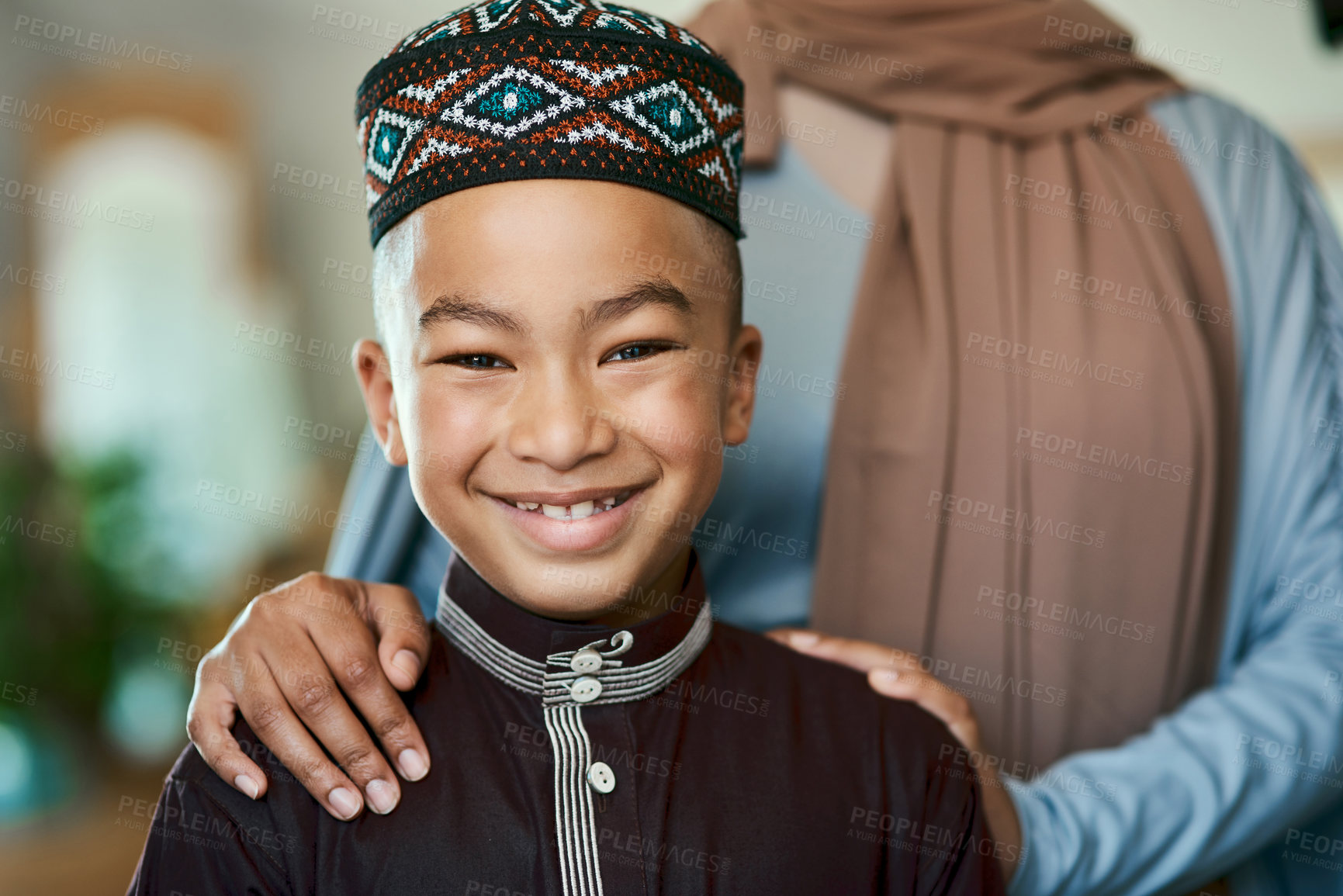 Buy stock photo Shot a young boy stand with his mother at home