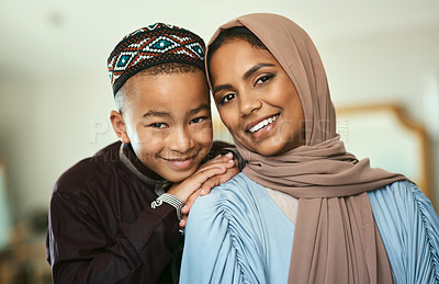 Buy stock photo Shot a young boy stand with his mother at home