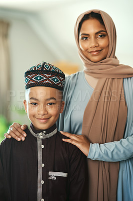 Buy stock photo Shot a young boy stand with his mother at home