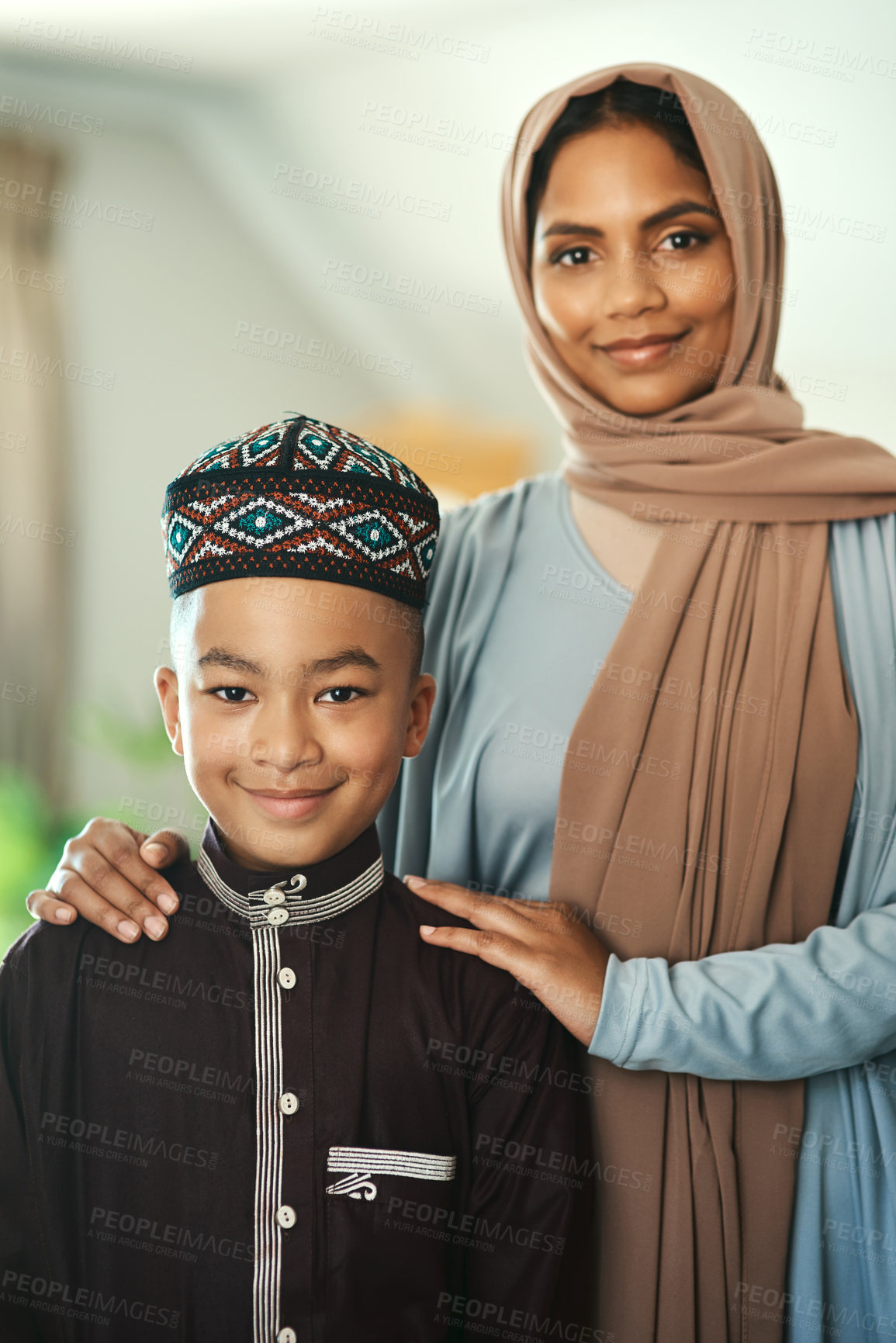 Buy stock photo Shot a young boy stand with his mother at home