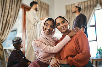 Buy stock photo Shot of two muslim sisters bonding