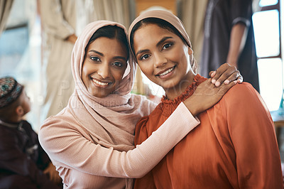 Buy stock photo Shot of two muslim sisters bonding