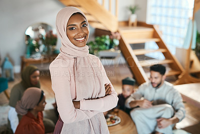 Buy stock photo Muslim islam woman on EID with family at house in  
Pakistan, Saudi Arabia or Iran to celebrate ramadan. Young girl smile in hijab with food in solidarity on islamic holiday together in family home