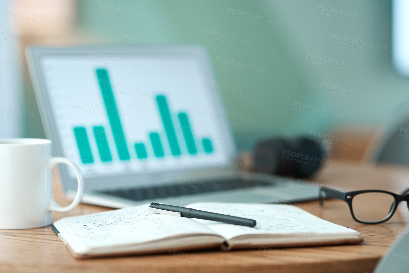 Buy stock photo Empty shot of a laptop and notebook on a table at home