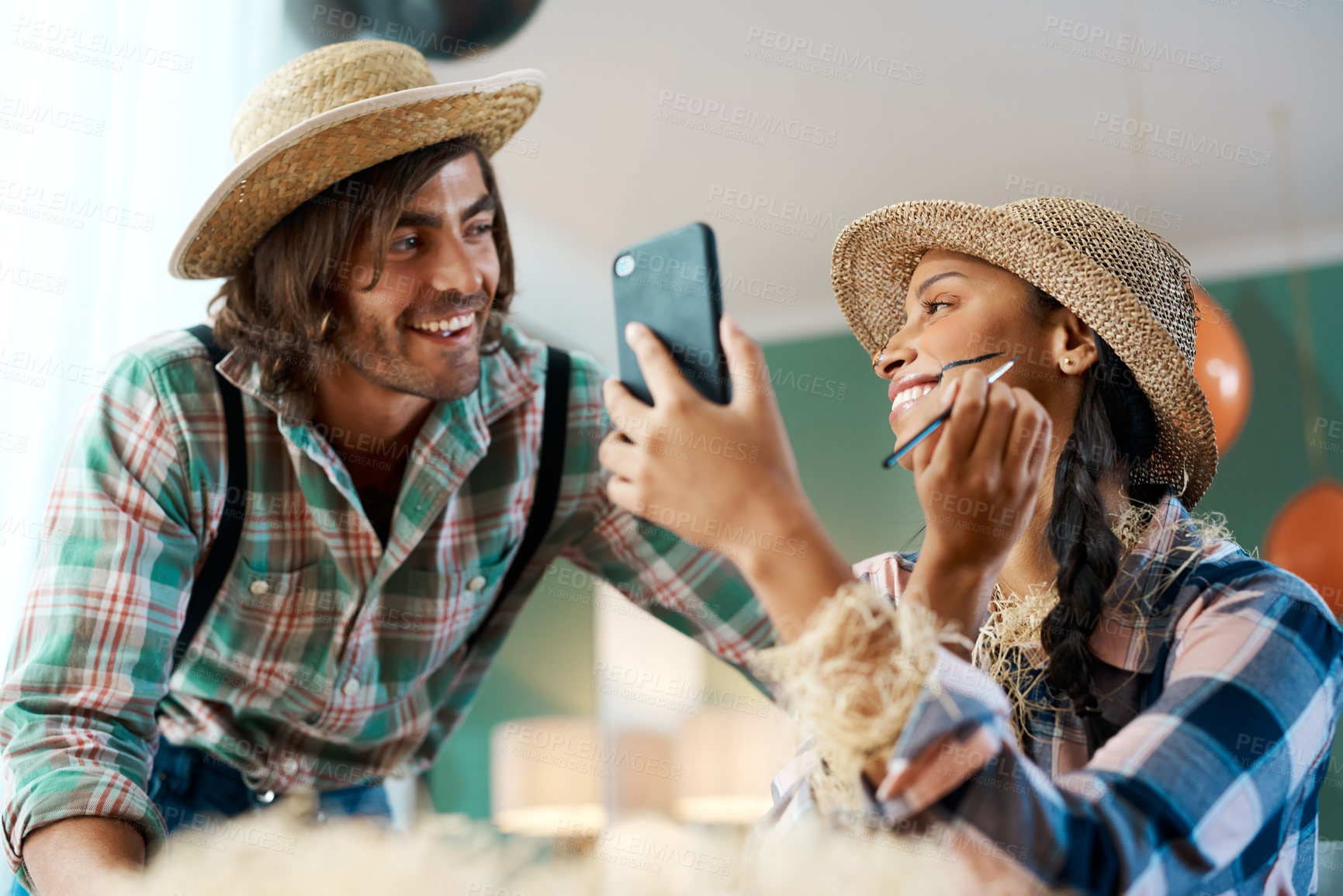 Buy stock photo Shot of a young couple talking while applying makeup at home