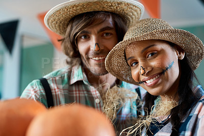 Buy stock photo Shot of a young couple dressed up for halloween at home