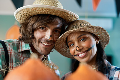 Buy stock photo Shot of a young couple dressed up for halloween at home