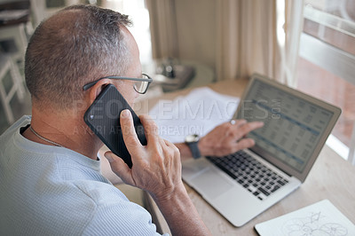 Buy stock photo Shot of a mature man using his smartphone to make a call