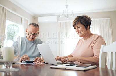 Buy stock photo Shot of a mature couple calculating their budget together