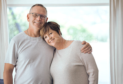 Buy stock photo Shot of a mature couple hugging