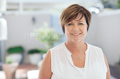 Buy stock photo Shot of a mature woman enjoying some time outside