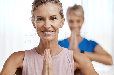 Buy stock photo Portrait of two mature women exercising  together at home