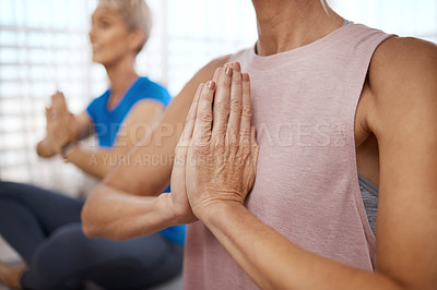 Buy stock photo Closeup shot of two unrecognizable women doing exercises on the floor together at home