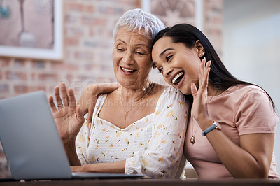 Buy stock photo Shot of a senior woman using a laptop with her daughter to make a video call at home