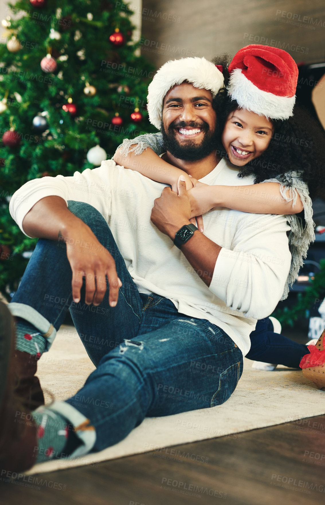 Buy stock photo Father, child portrait, hug and Christmas holiday celebration, together and happy with smile at home. Christmas tree, decoration and festive, Mexican man and girl celebrate with love and care.