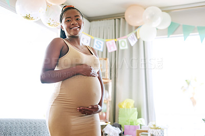 Buy stock photo Shot of a happy young mother celebrating her baby shower