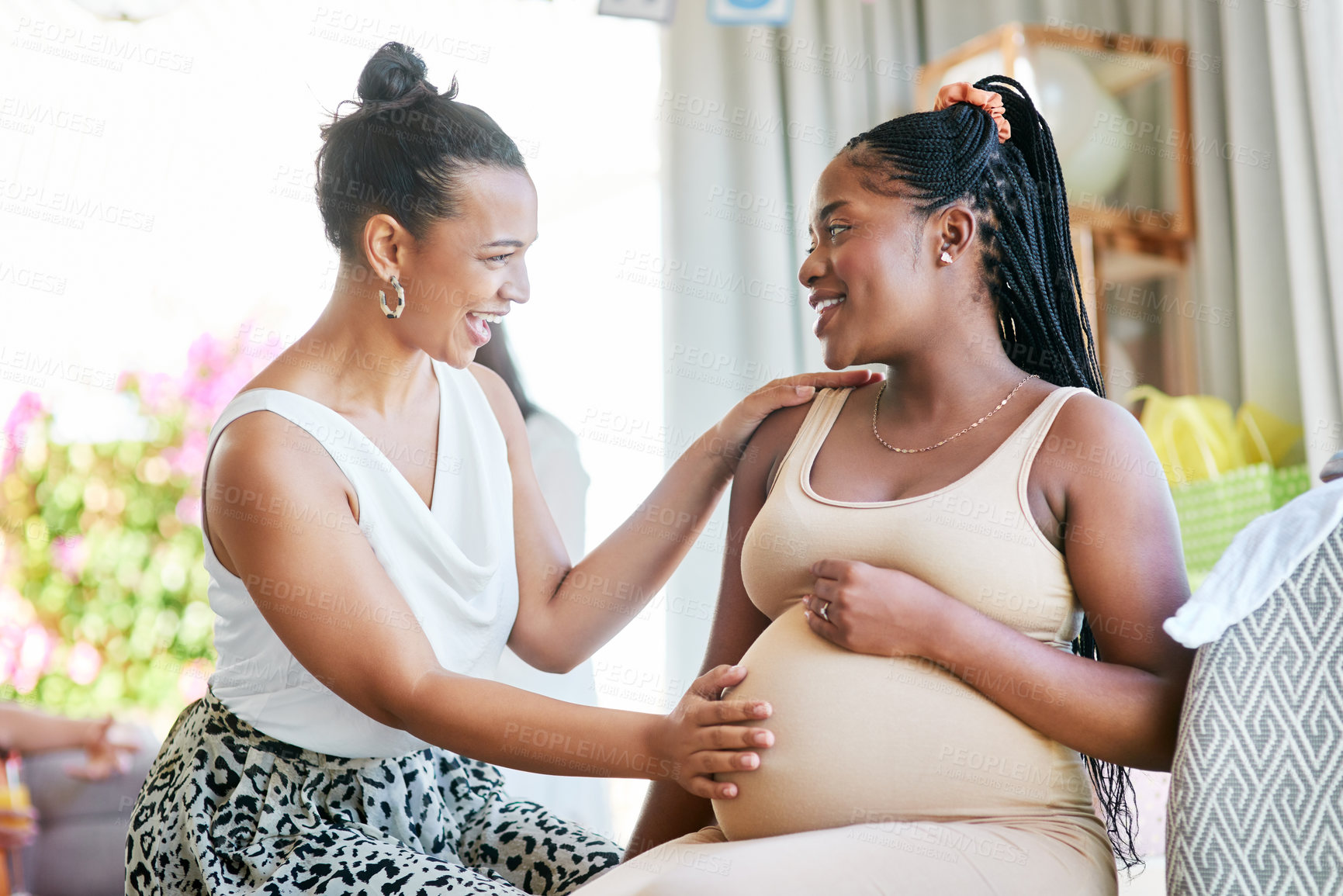 Buy stock photo Pregnant, friends and woman touching a stomach, baby shower and excited with happiness, home and support. Female people, girls and lady feeling belly, pregnancy and event with celebration and party