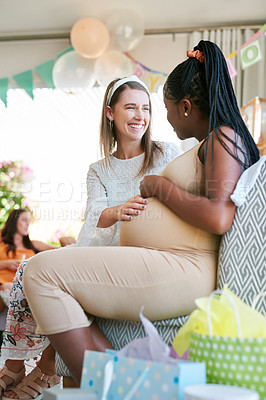 Buy stock photo Shot of two women relaxing during a baby shower