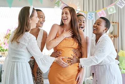 Buy stock photo Shot of a group of friends celebrating at a baby shower