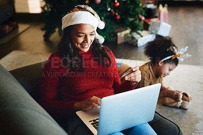 Buy stock photo Christmas online shopping, e commerce and woman with credit card and laptop for internet and payment online. Holiday retail sale, family and ecommerce with mother buying and child playing on floor.