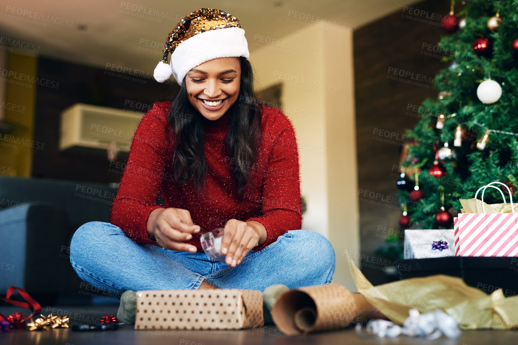 Buy stock photo Woman, wrapping gift for Christmas with tape and gift box, holiday celebration and happiness. Happy woman on living room floor, present with ribbon and paper, smile and celebrate in family home.