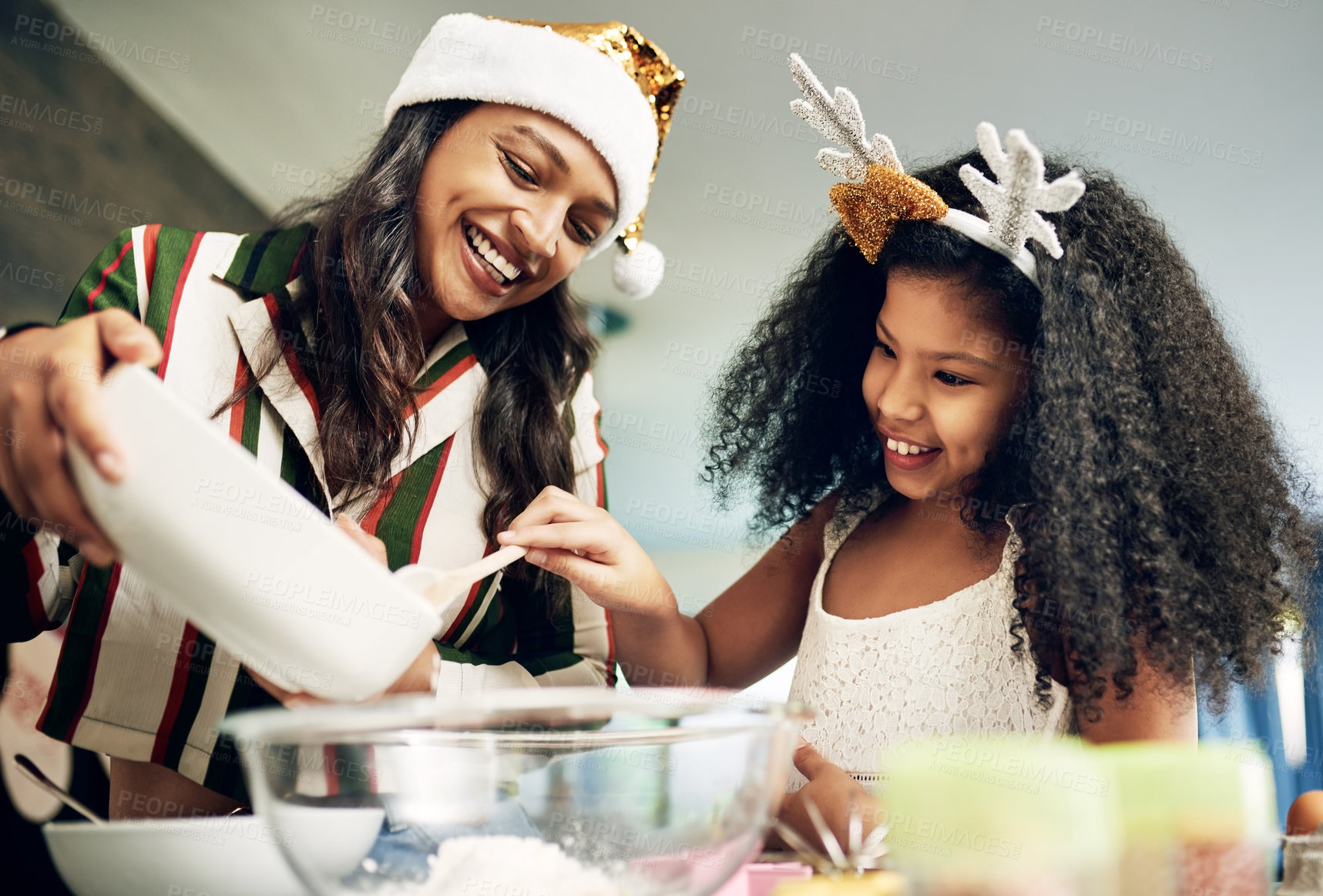 Buy stock photo Christmas, love and girl baking with mother in kitchen to make festive cookies, biscuits and treats. Black family, love and mom bake with child enjoying festival celebration, holiday and vacation