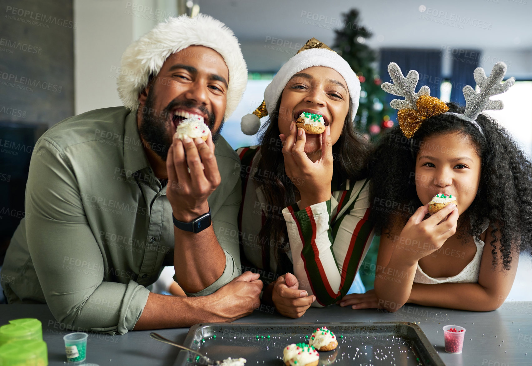 Buy stock photo Christmas, family and cookie eating of a mother, father and girl in a home kitchen with happiness. Holiday baking, celebration and family home portrait of a mom, dad and child together happy 