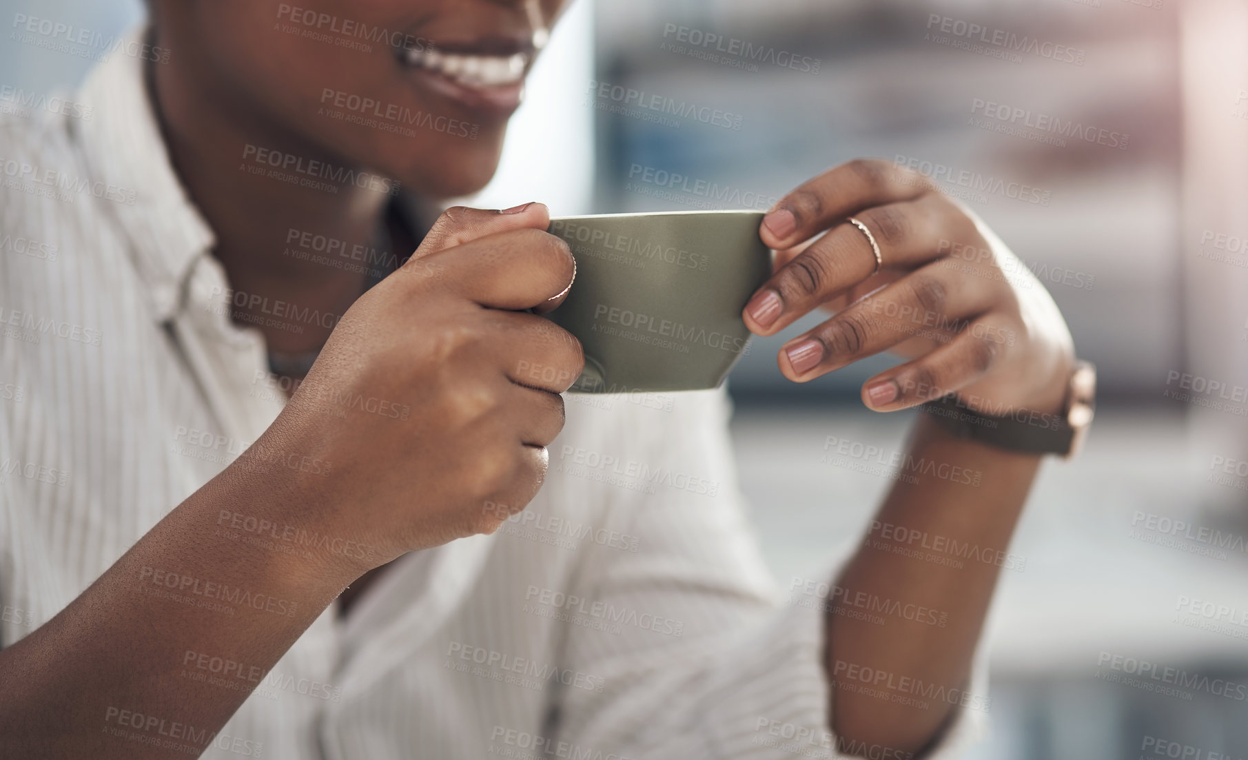 Buy stock photo Shot of a businesswoman enjoying a cup of coffee at work